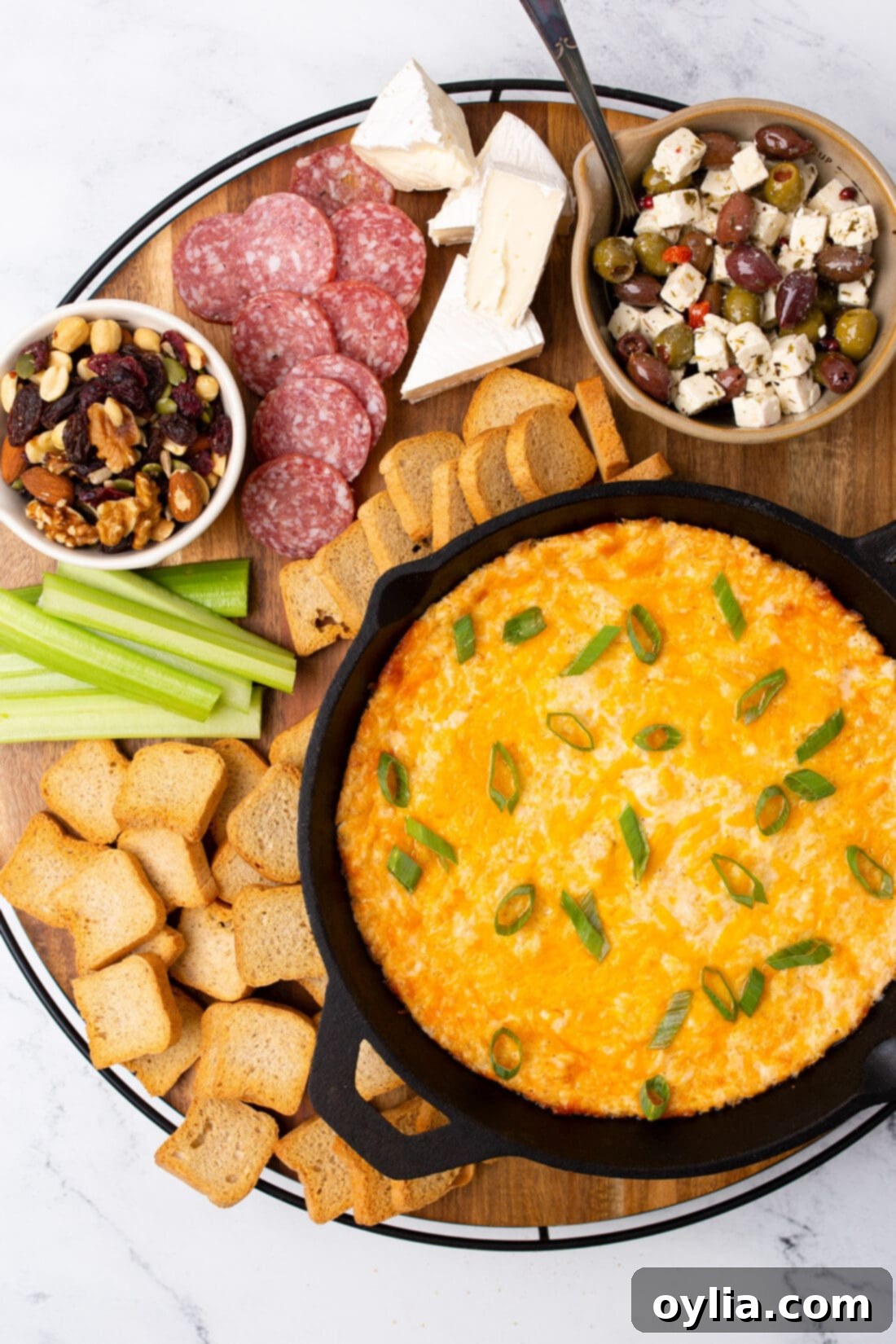 Ultimate Crab Dip 8 Crab Dip on a board with meat and cheese