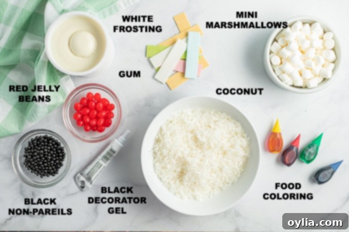 selection of ingredients for making bunny cupcakes including cake mix, frosting, gum, marshmallows, and food coloring