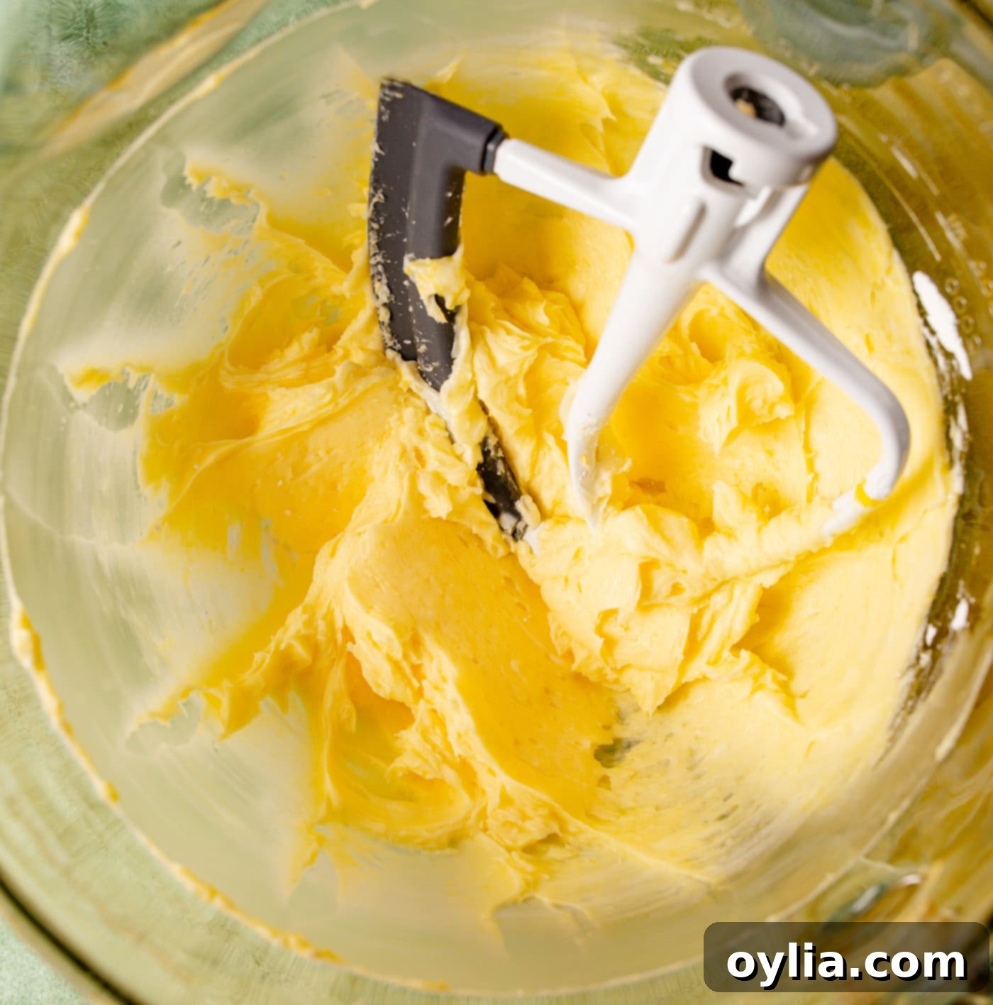 powdered sugar, butter, vanilla, almond extract and egg in a mixer bowl