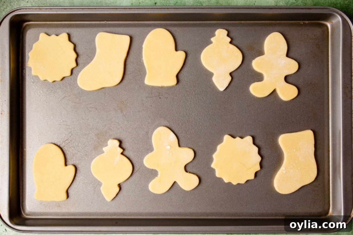 holiday sugar cookies on a baking sheet