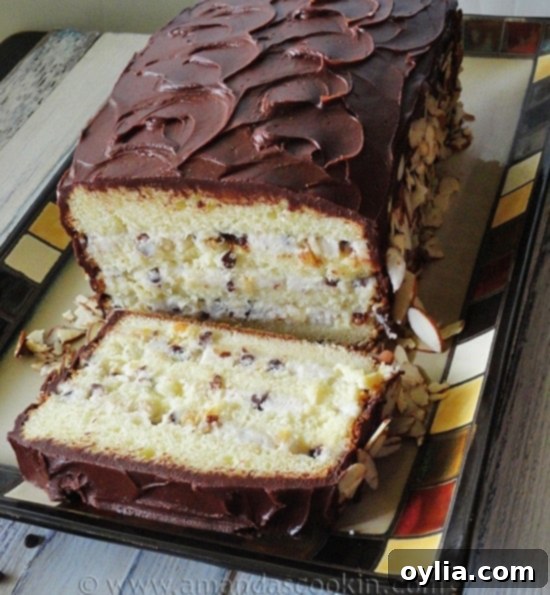 Side view of a sliced Cassata Cake revealing layers