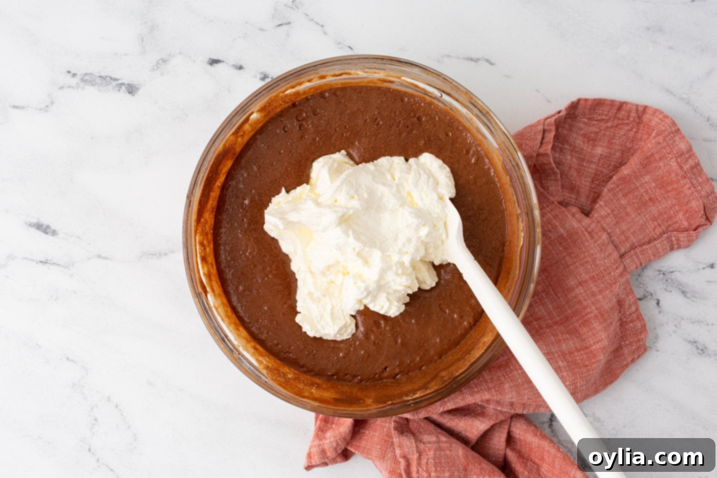 Velvety Chocolate Dream 8 folding whipped cream into chocolate mousse