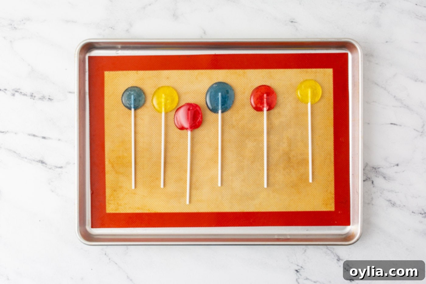 homemade lollipops on a baking sheet
