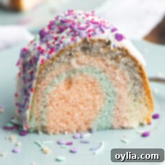 Unicorn Bundt Cake with colorful sprinkles and a vanilla glaze