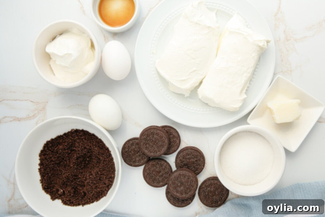 Essential ingredients for Instant Pot Oreo Cheesecake laid out on a clean surface