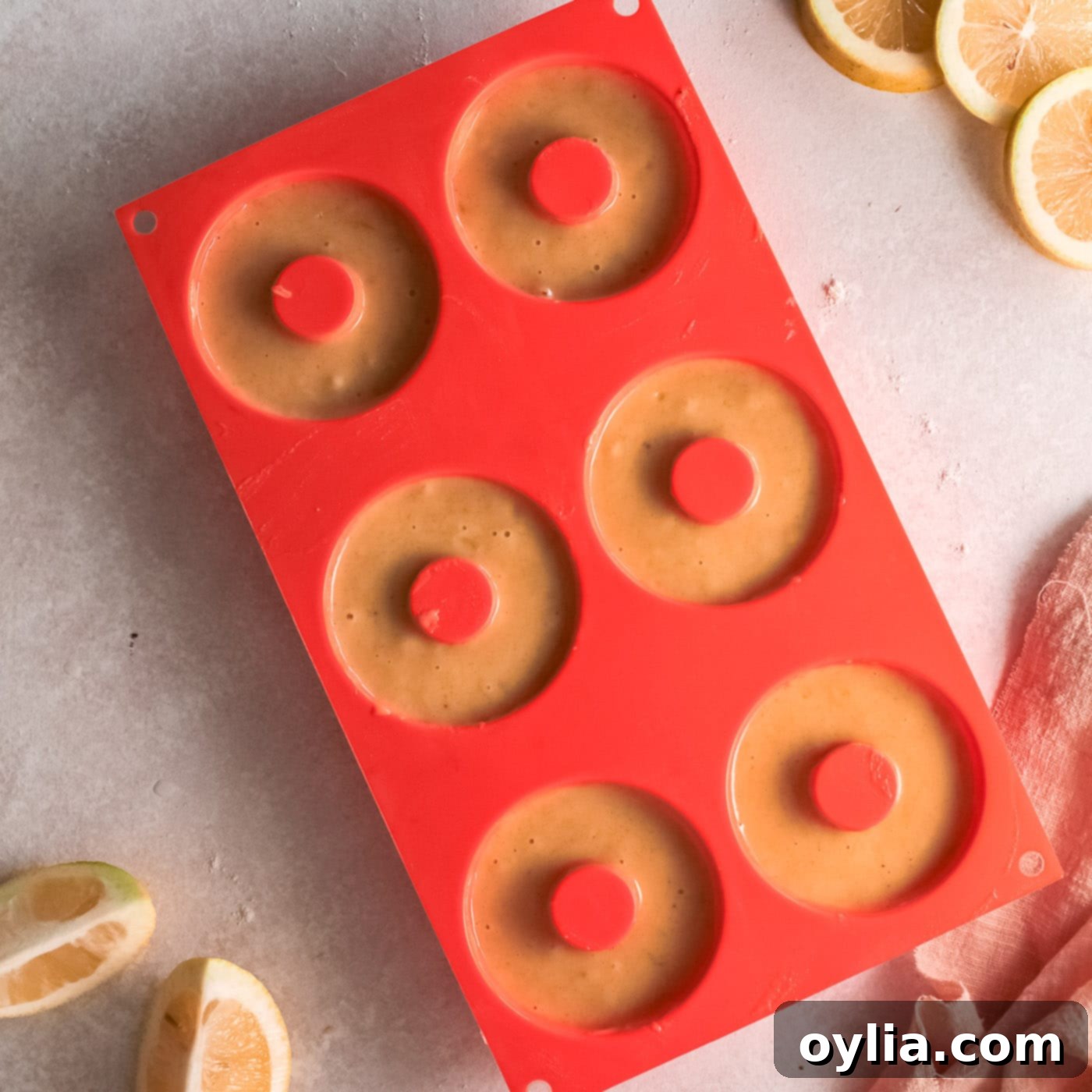 donuts baking in a silicone donut pan
