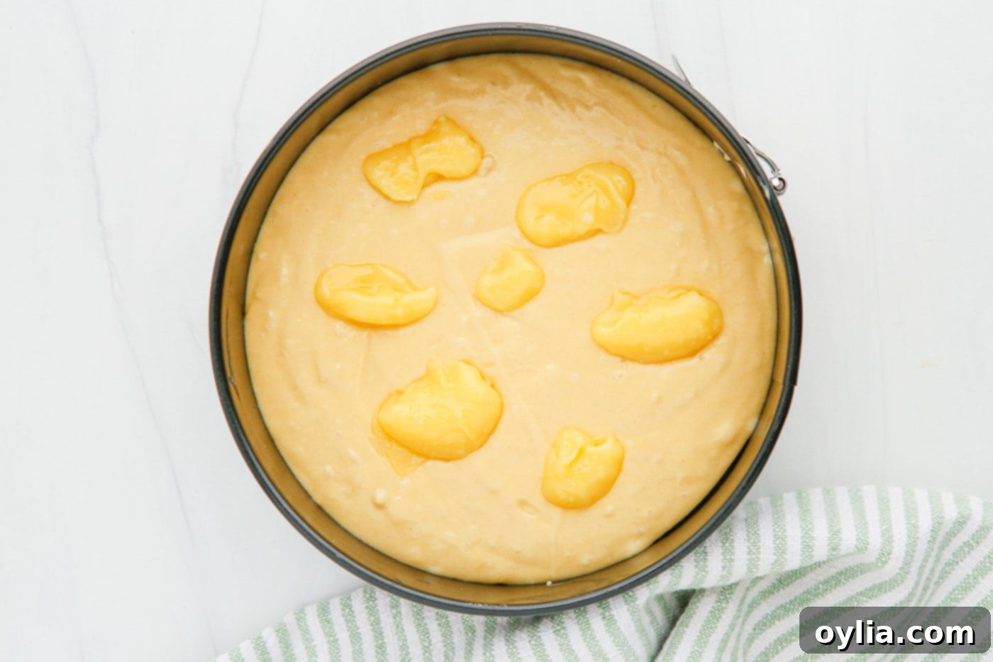 lemon curd on top of cake batter