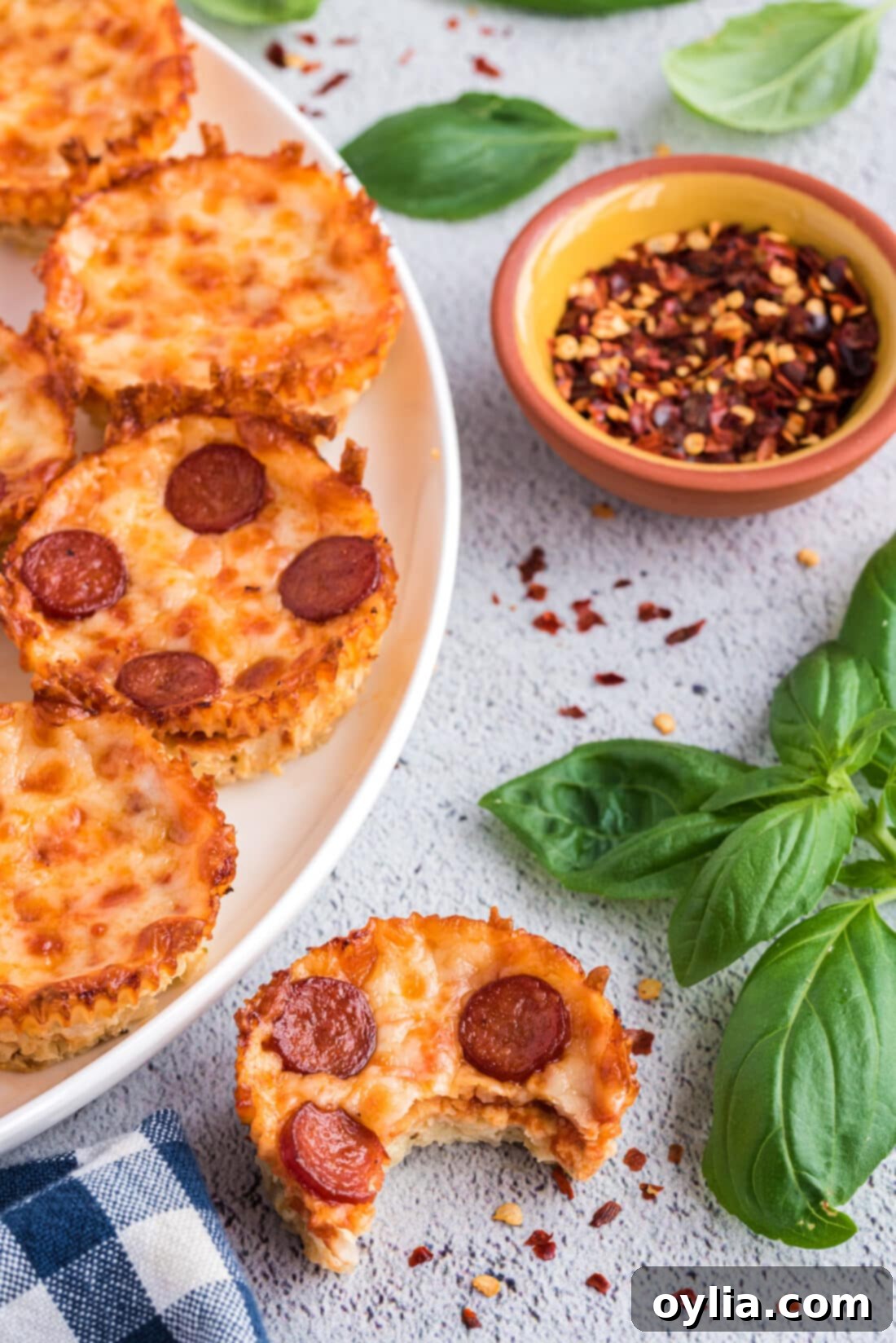 Cauliflower Pizza Bites on a plate, ready to be enjoyed as a low-carb snack or meal.