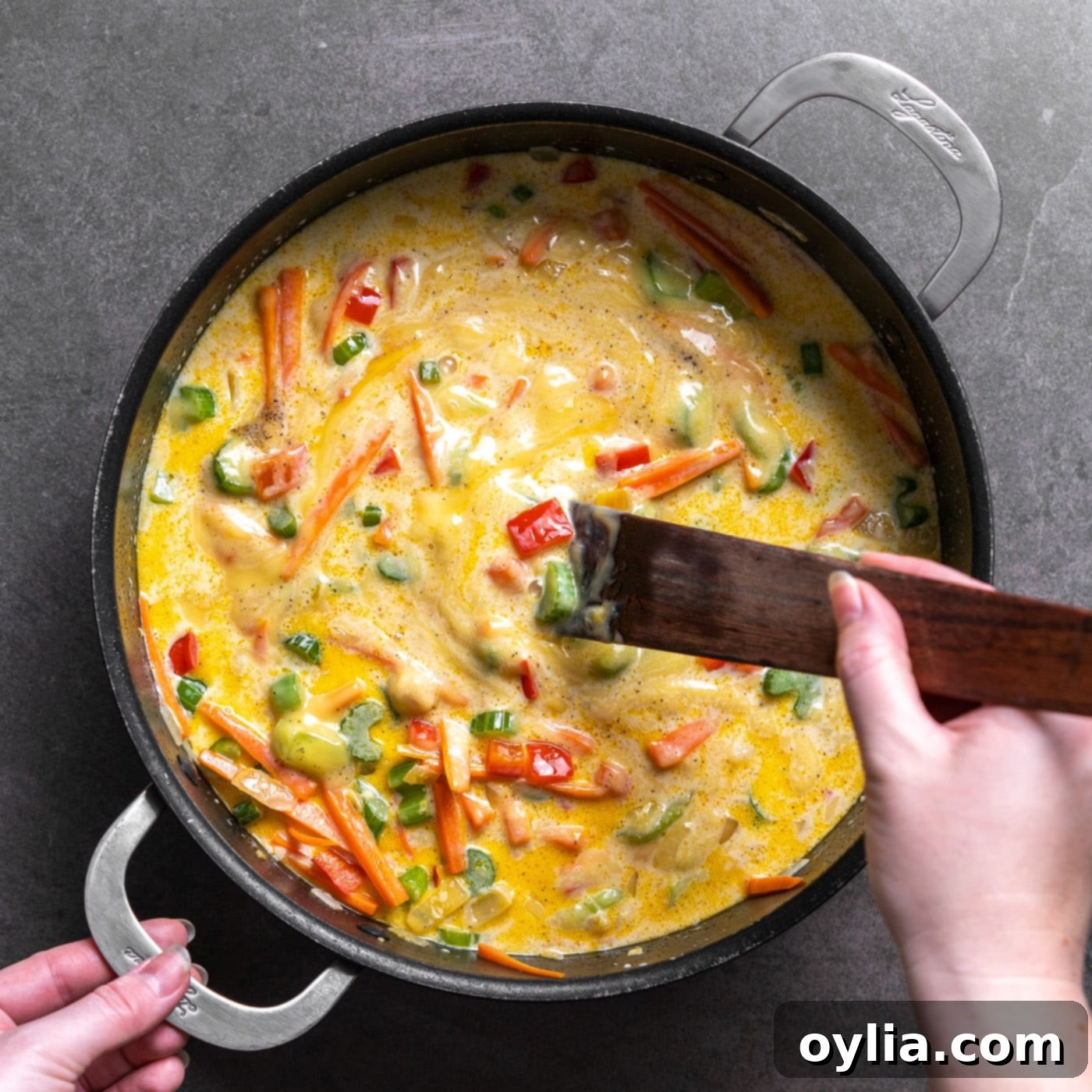 The creamy, savory sauce for the Chicken Chow Mein Casserole being stirred in the skillet.