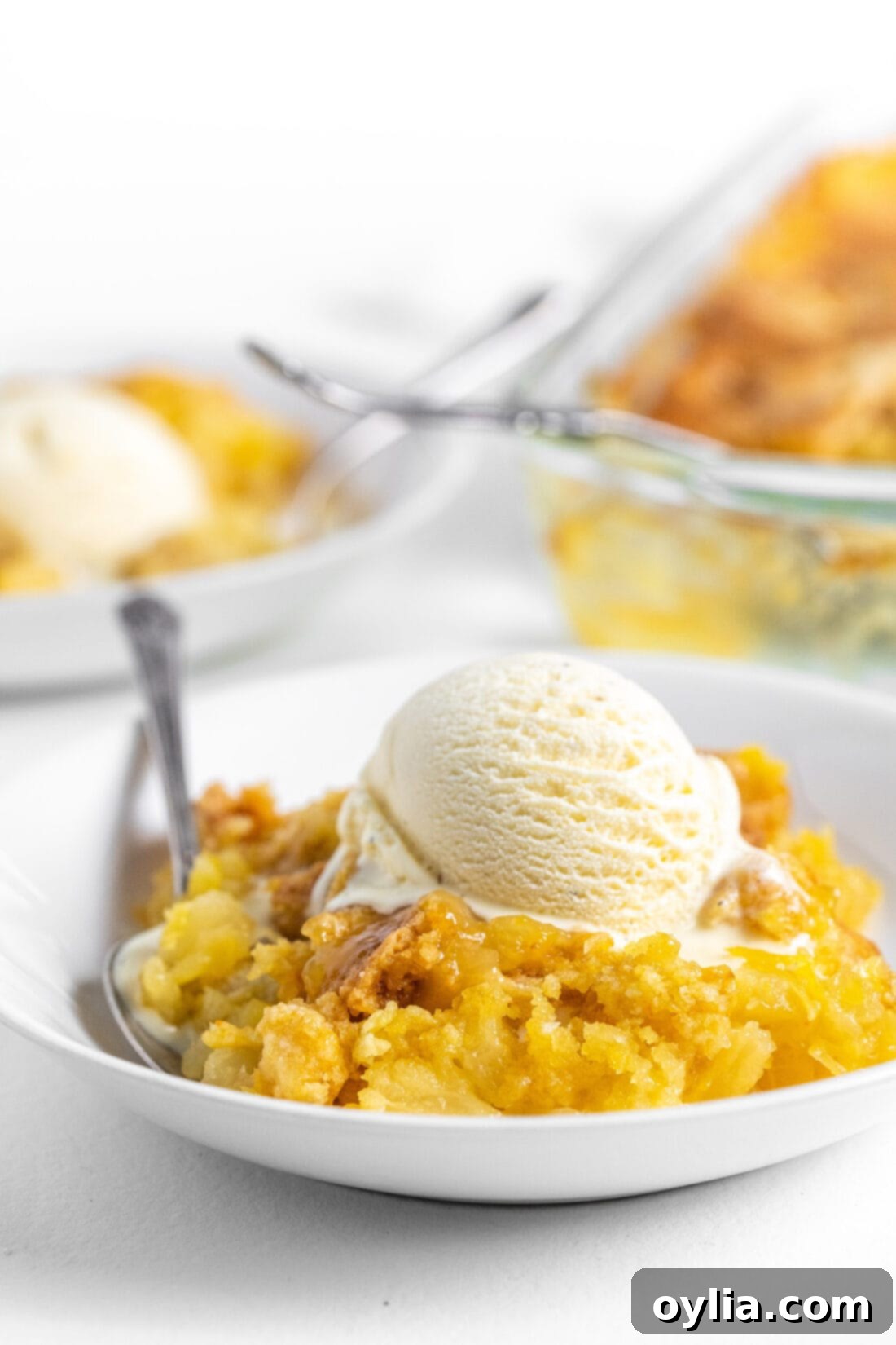 Golden Pineapple Delight 2 Pineapple Dump Cake with ice cream
