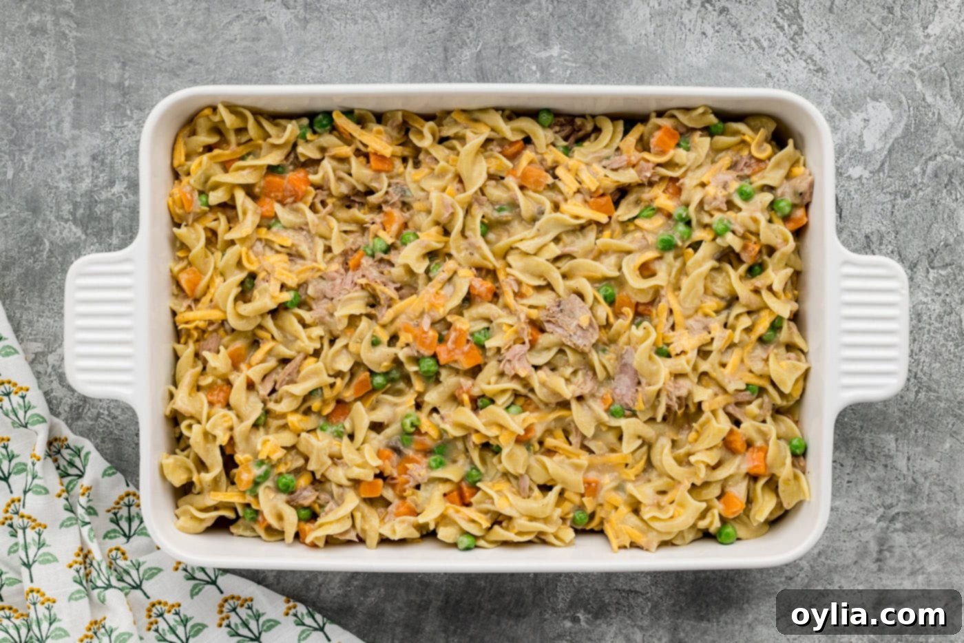 tuna casserole mixture in a baking dish before adding topping