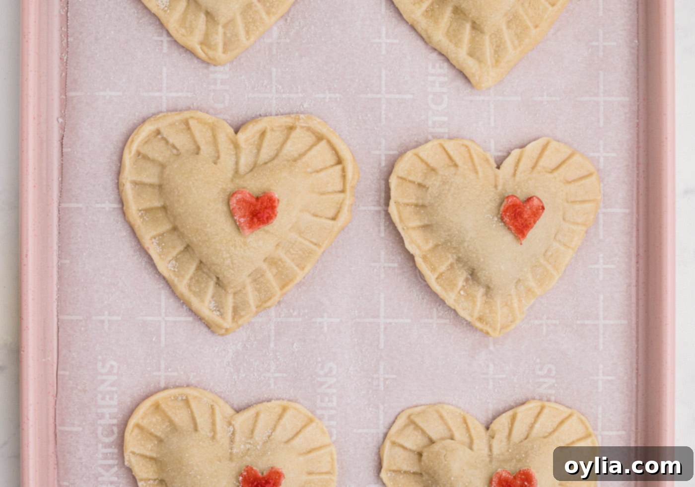 cherry hand pies with red hearts