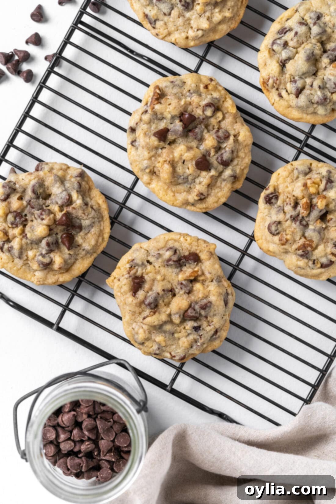 Freshly baked Doubletree Chocolate Chip Cookies cooling on a wire rack, ready to be enjoyed