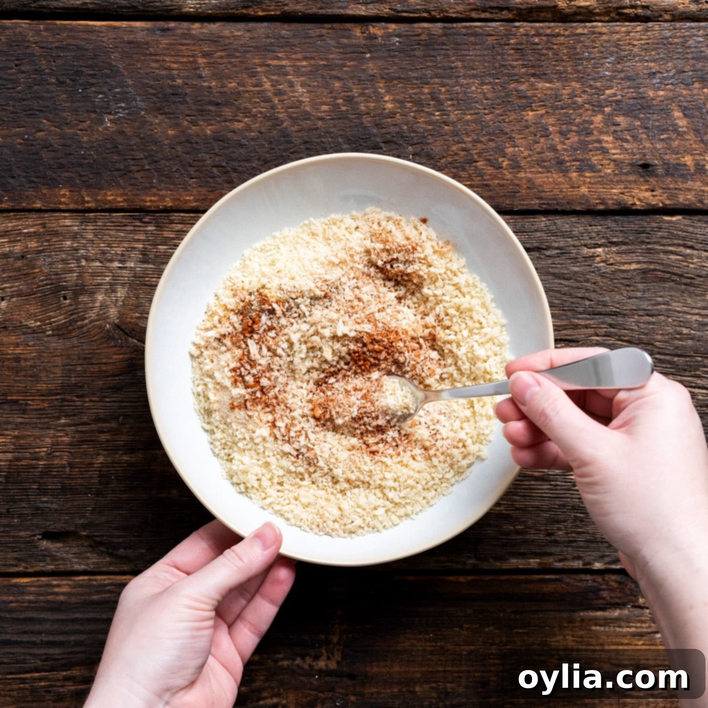 seasonings mixed with breadcrumbs in a bowl