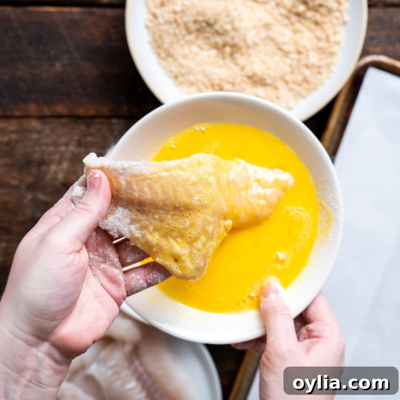 dipping cod into egg