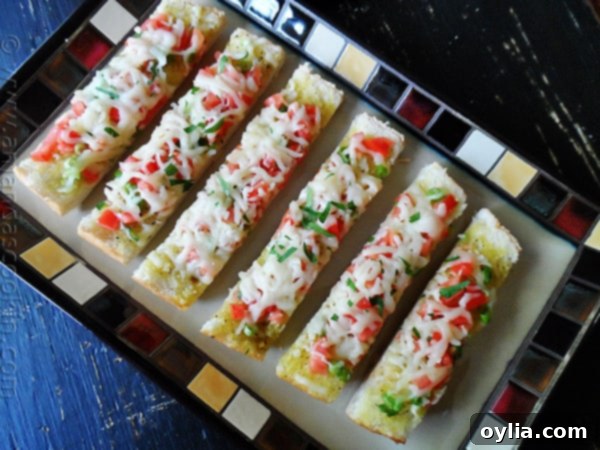 An overhead photo of mozzarella provolone bruschetta. 
