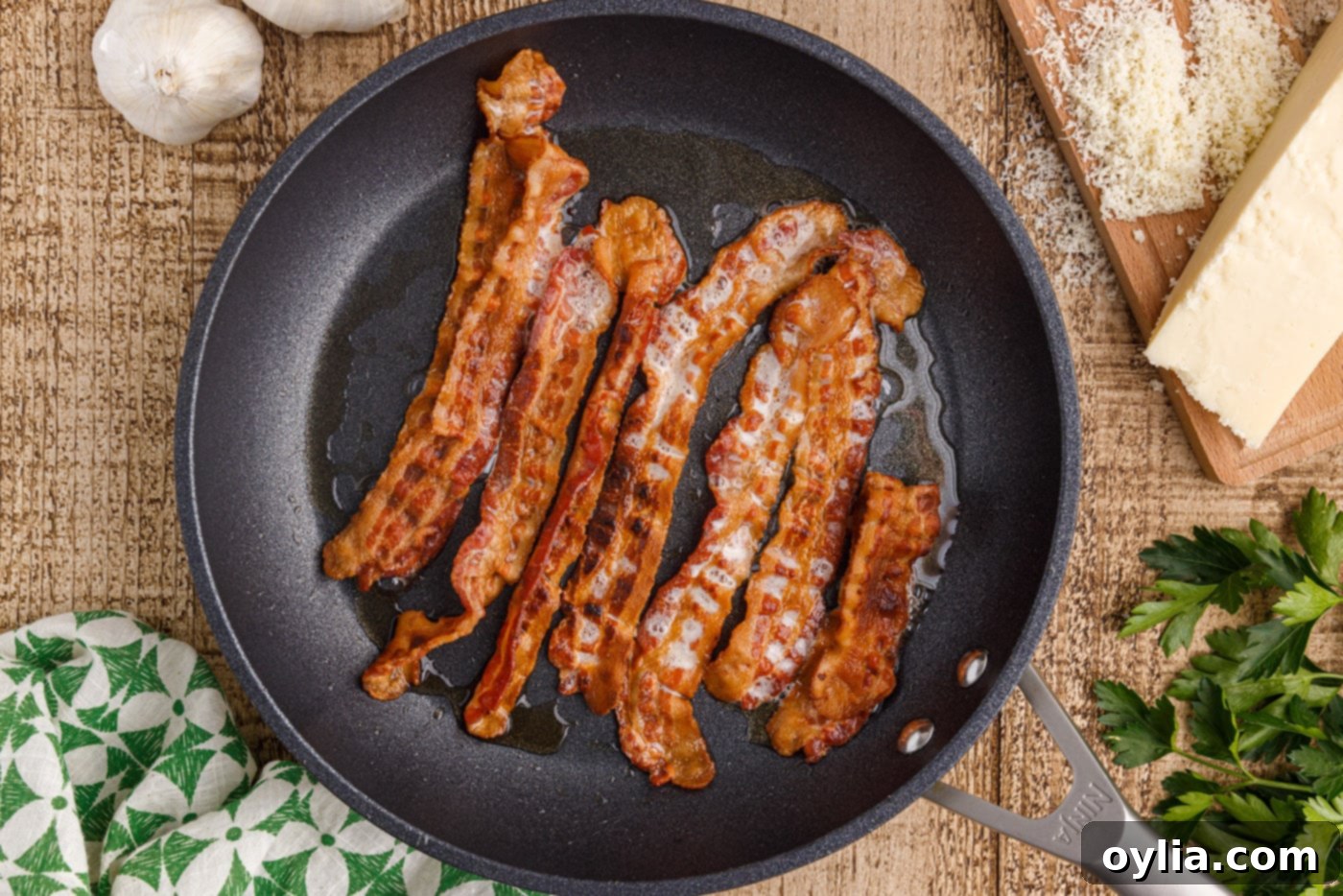 bacon cooking on a skillet