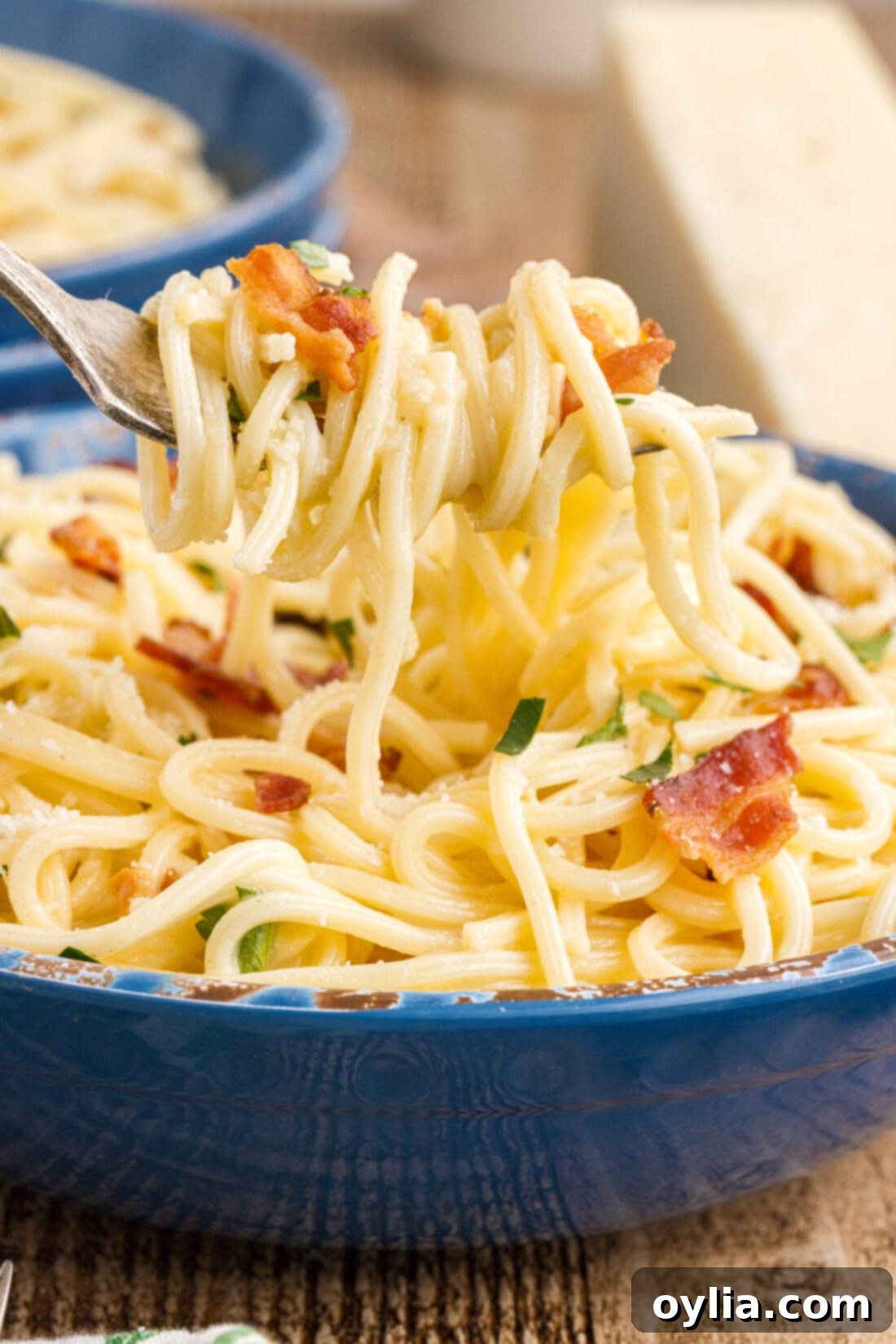lifting Pasta Carbonara with a fork