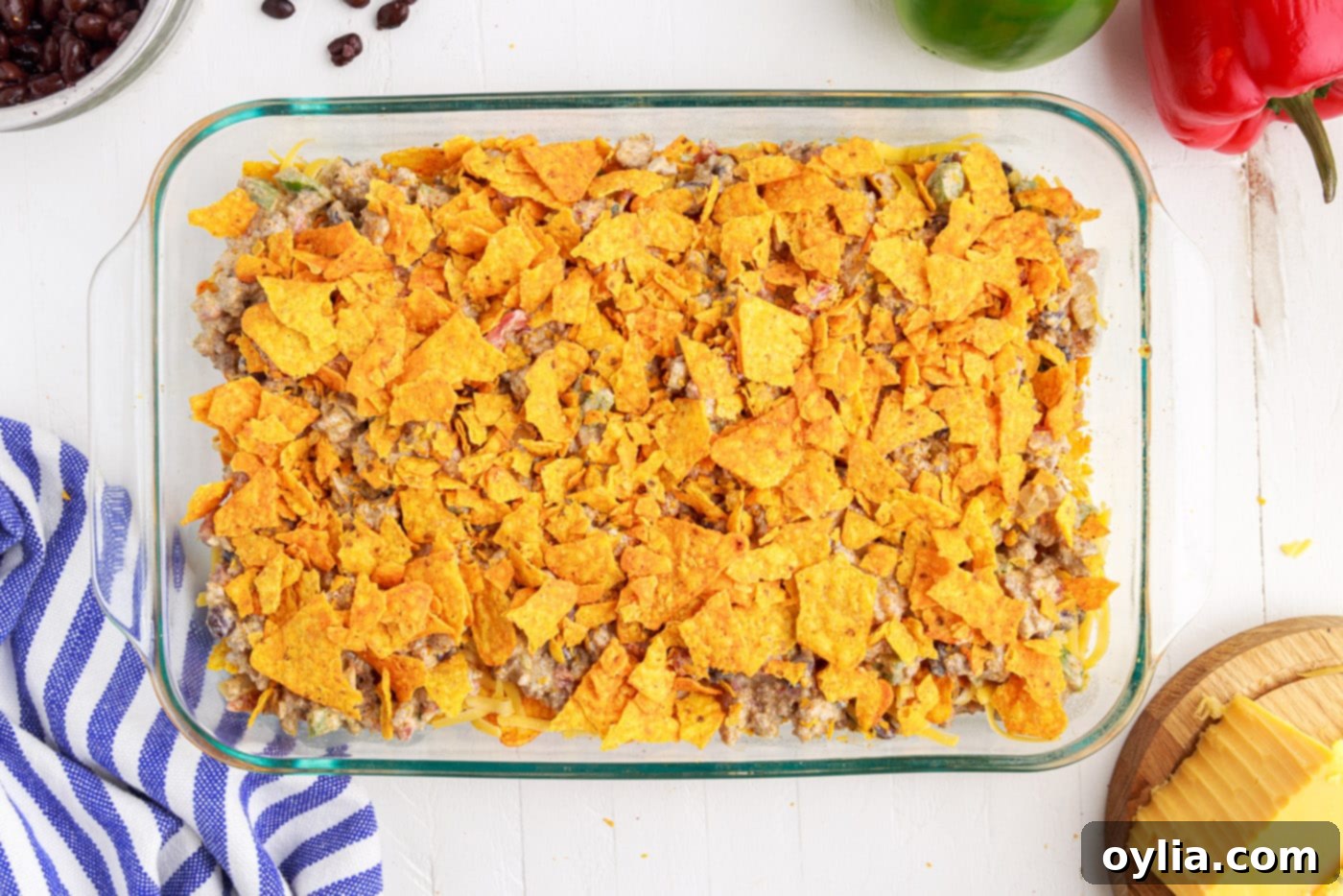 crushed doritos chips over the top of dorito casserole