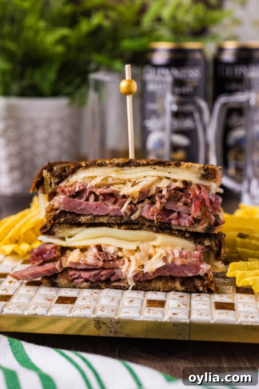 Reuben Sandwich on a plate with chips