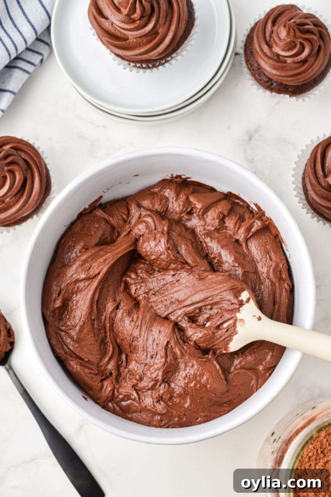 Decadent Chocolate Fudge Frosting 2 Chocolate Fudge Frosting in a bowl, showing its rich, smooth texture.