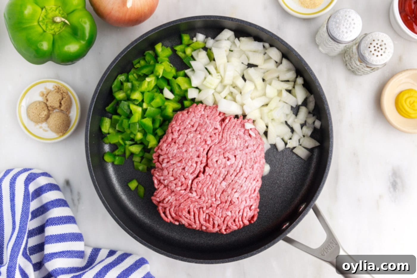 ground beef, onion, and bell pepper in a skillet