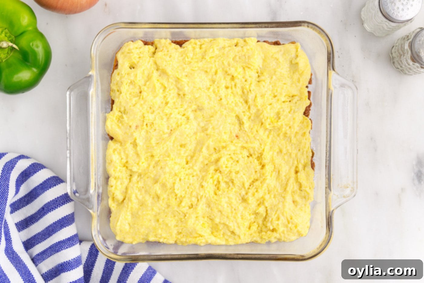sloppy joe cornbread casserole in a baking dish