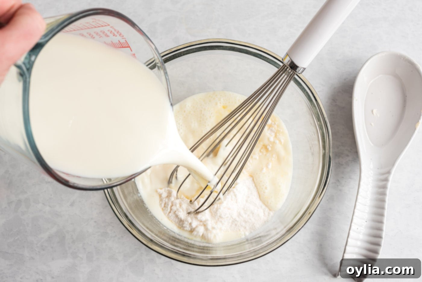 milk and instant vanilla pudding in a bowl