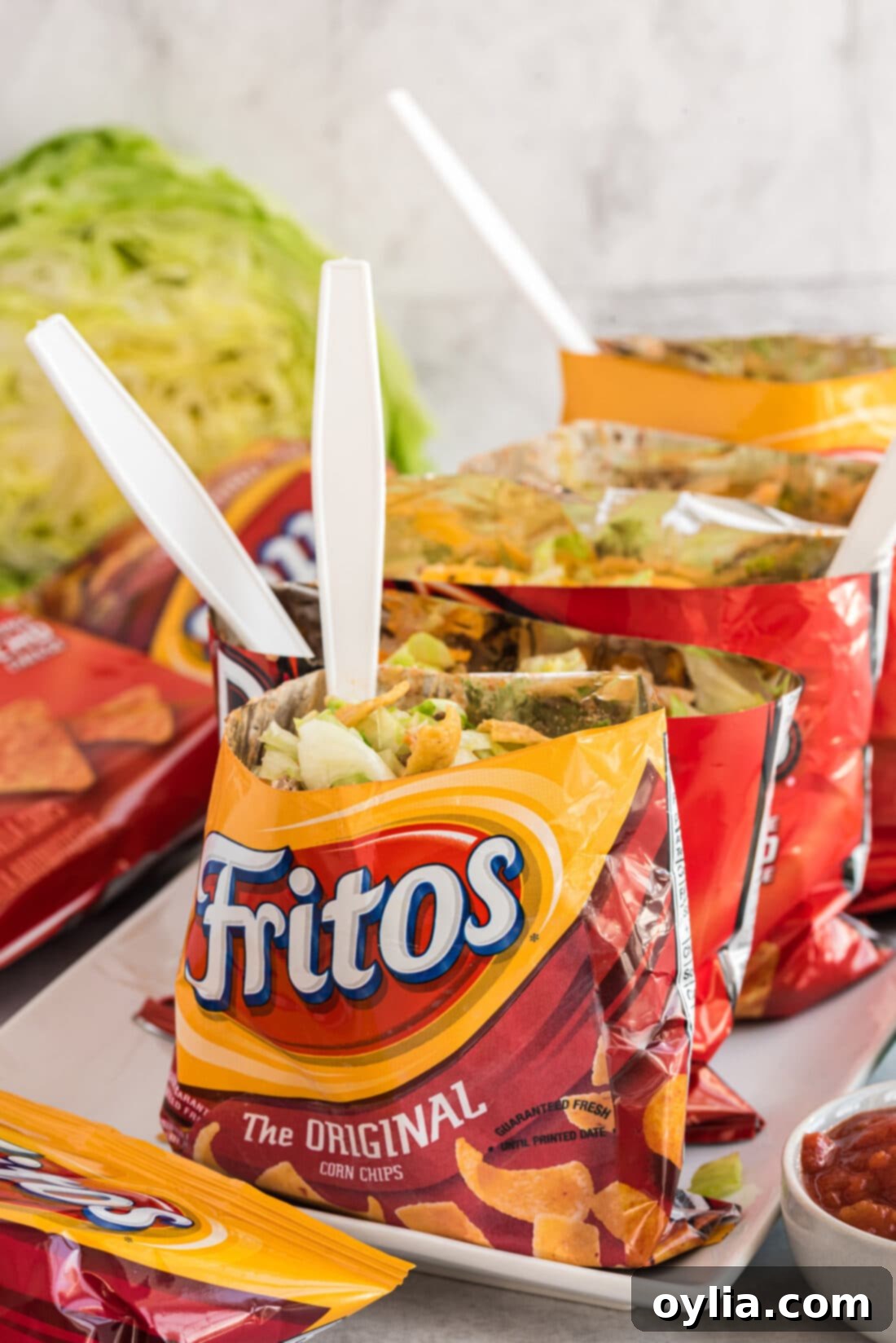 Walking Tacos on a tray, ready to be served at a gathering or party.