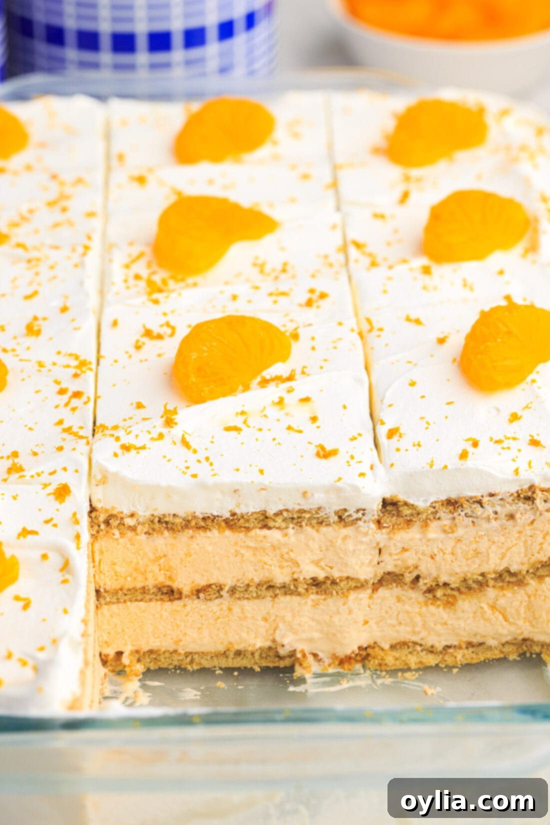 pan of Orange Icebox Cake cut into pieces