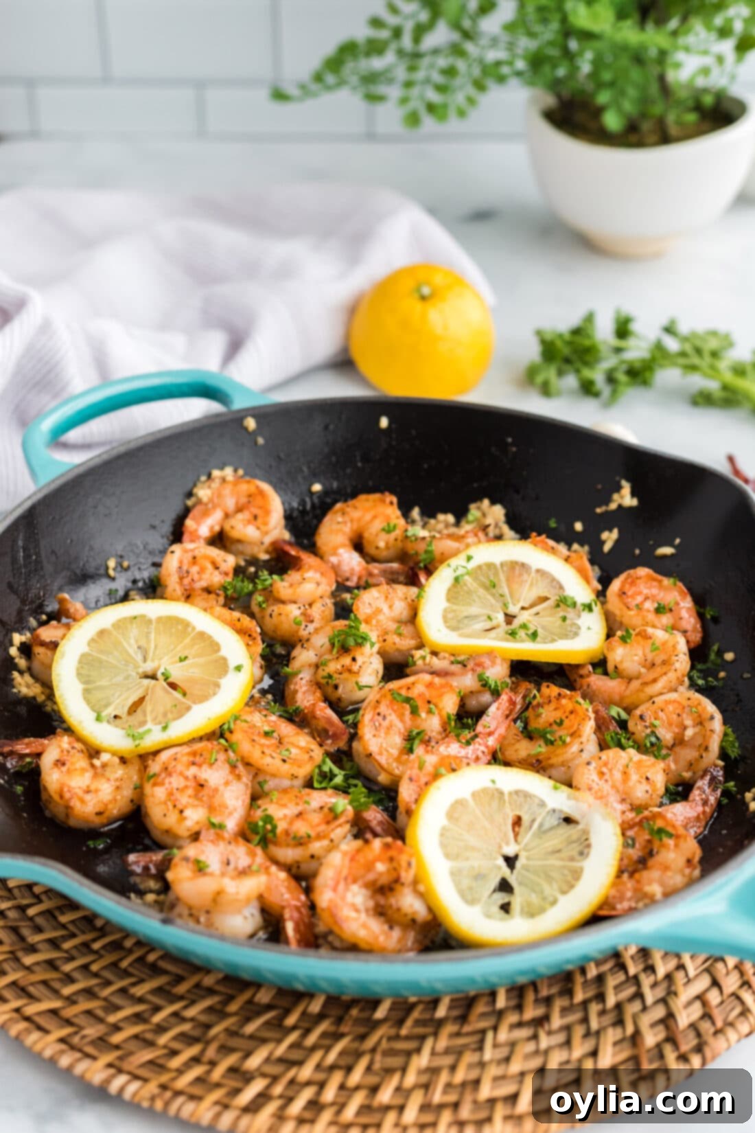 skillet of Sauteed Shrimp ready to serve, garnished with parsley