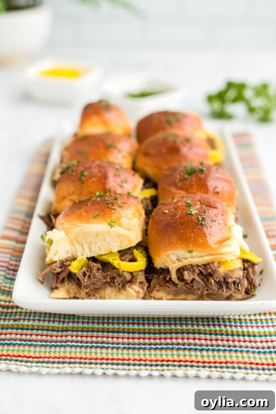 Homestyle Mississippi Pot Roast Sliders 2 Mississippi Pot Roast Sliders on a platter