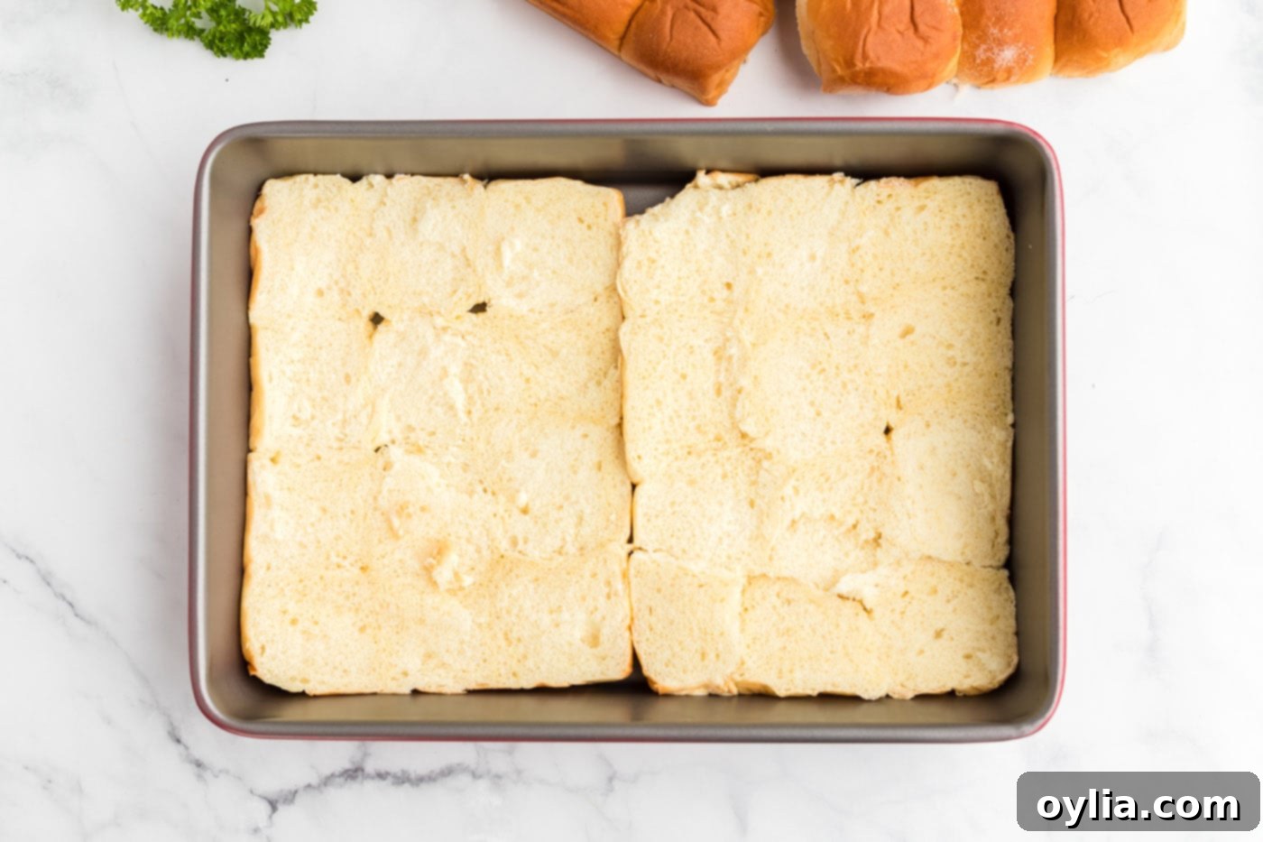 hawaiian rolls in a baking pan