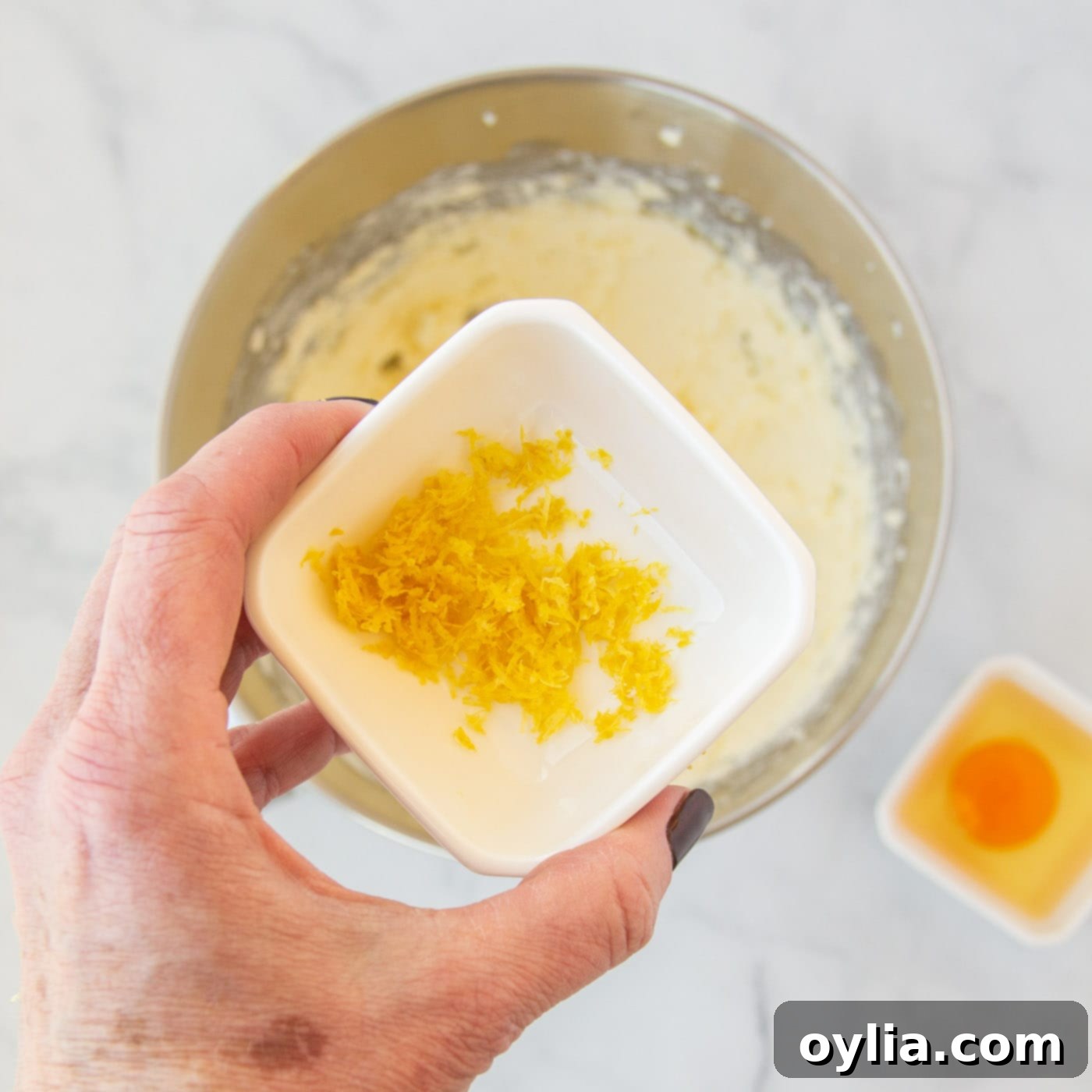 Sprinkling fresh lemon zest into the cookie dough mixture for enhanced citrus flavor