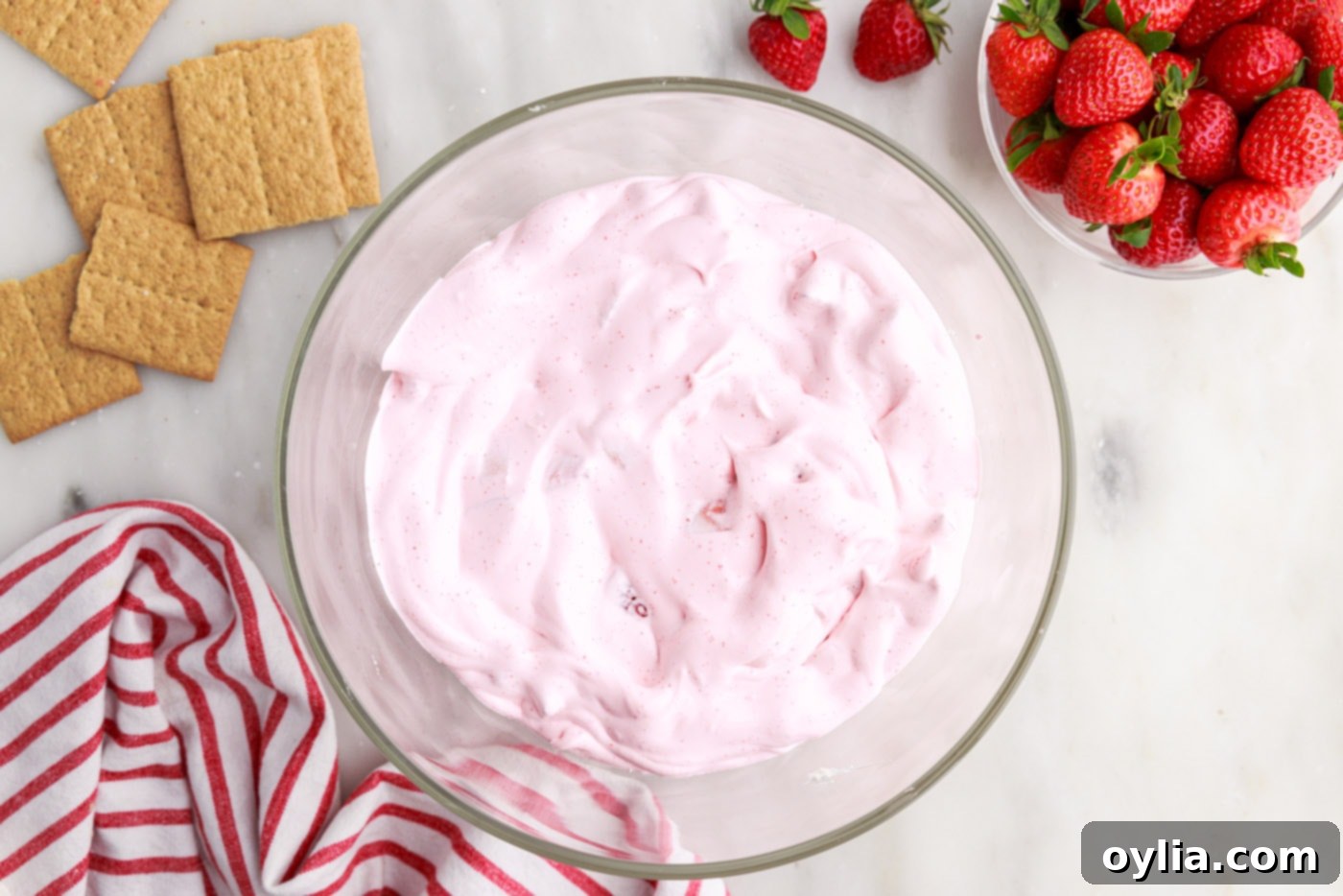 whipped strawberry jello layer in trifle bowl