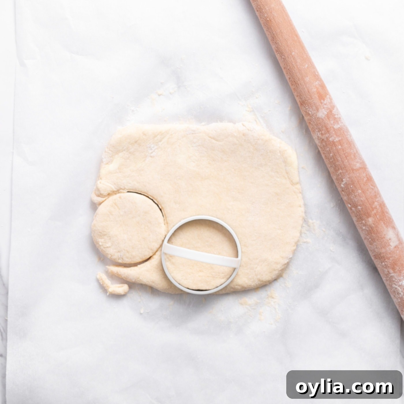 biscuit cutters cutting dough