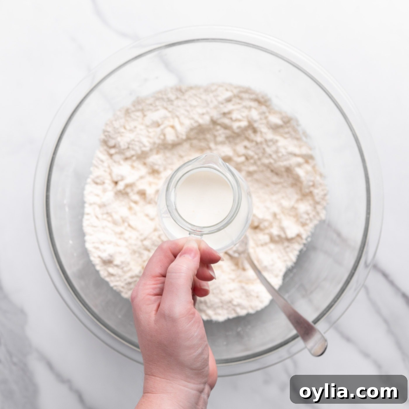 adding buttermilk to biscuit dry ingredients