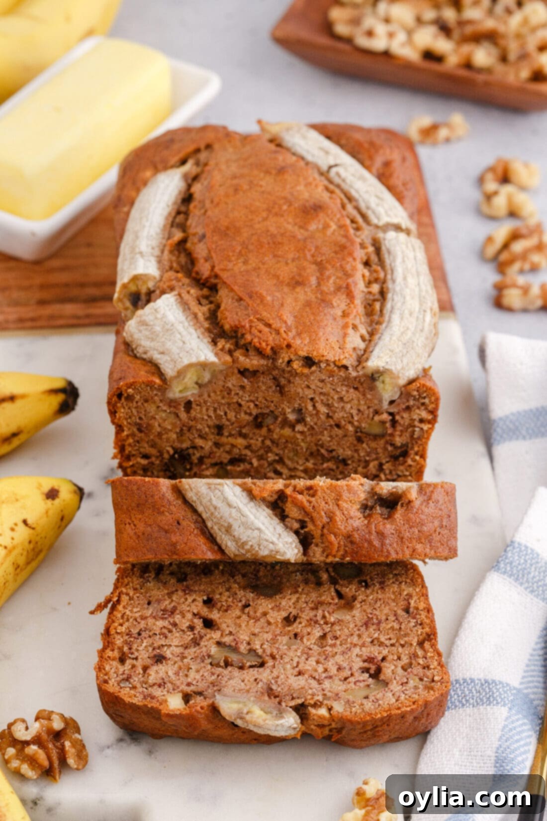 sliced Banana Nut Bread, showing moist texture and walnuts