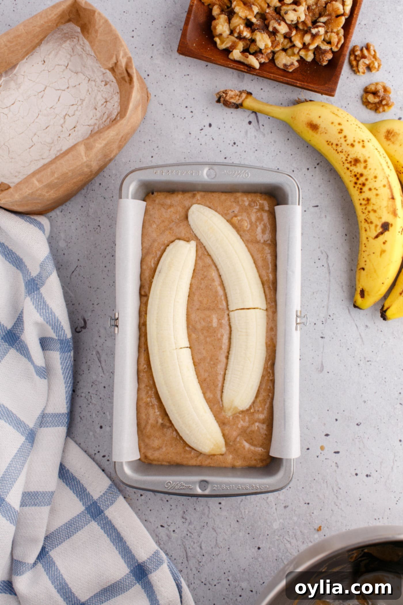 banana slice placed on top of banana bread batter for garnish