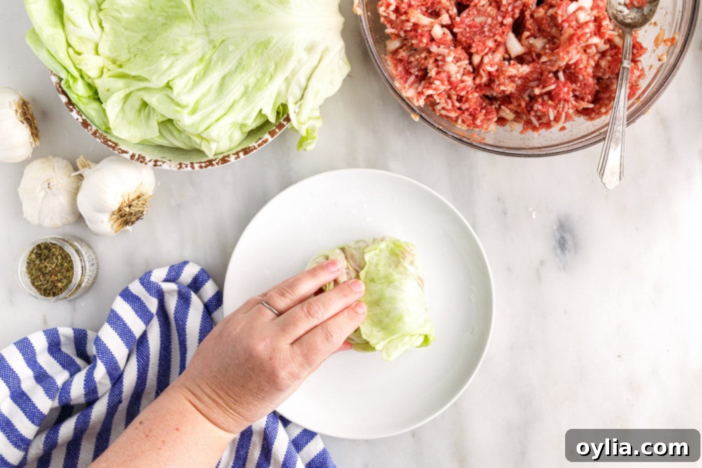 rolling cabbage rolls together