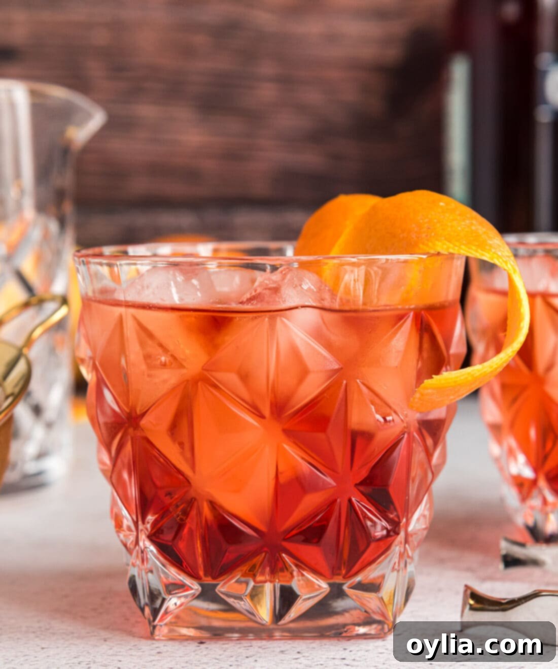 The Italian Standard 2 Negroni in a rock glass with orange garnish