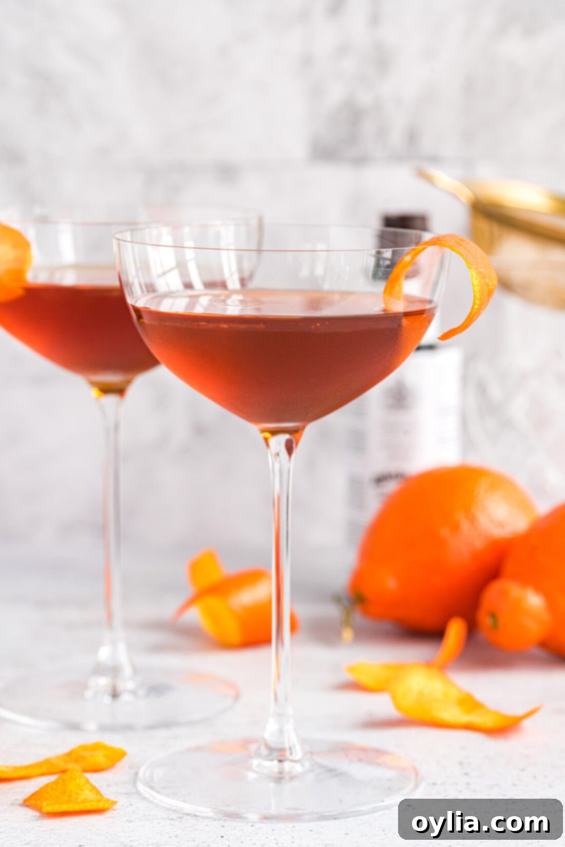 Manhattan Cocktail in a martini glass, garnished with a cherry