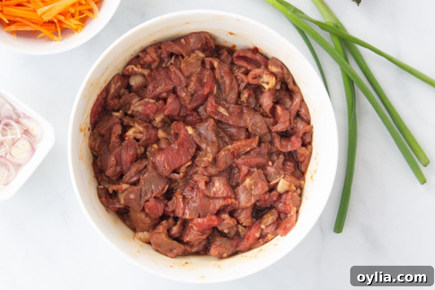 sliced sirloin steak in a bowl