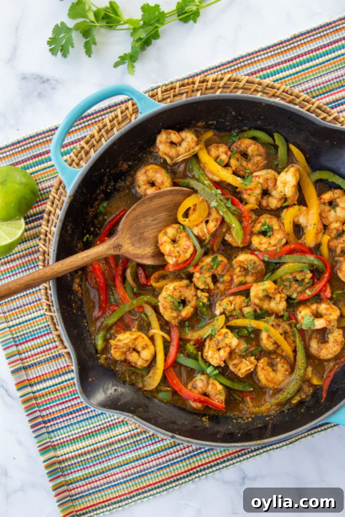 Freshly cooked shrimp fajitas sizzling in a cast iron skillet, ready to be served