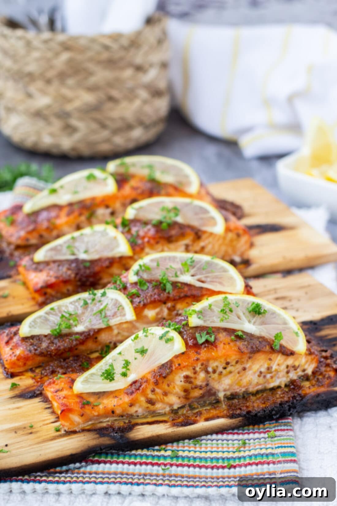 Smoky Cedar Salmon 3 Cedar Plank Salmon garnished with lemon