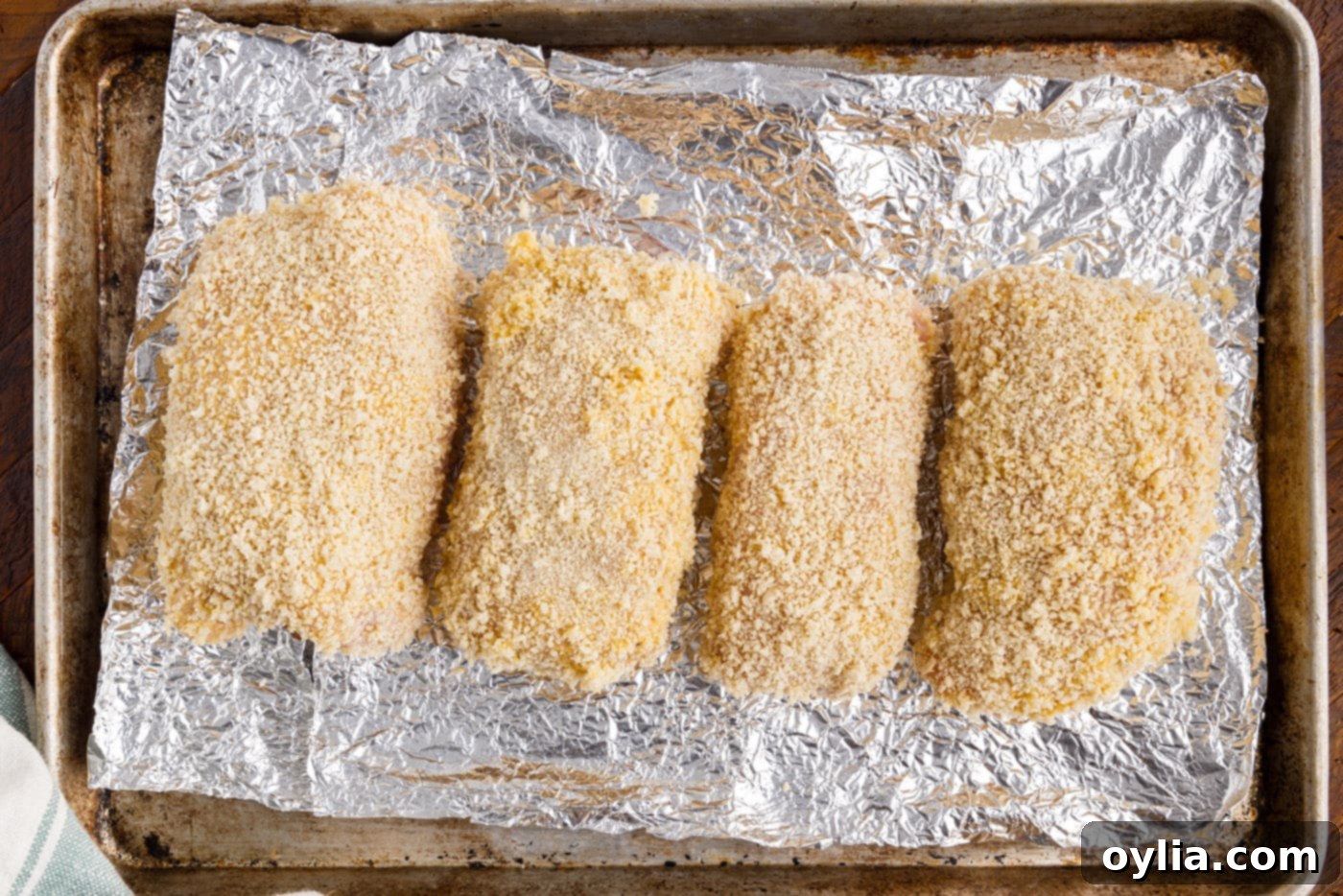 chicken cordon bleu on baking sheet