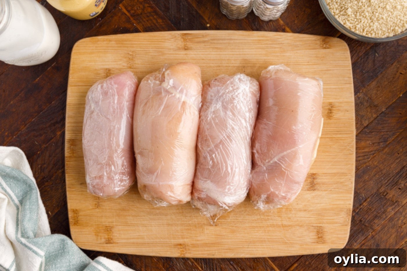 rolled chicken breast on a cutting board