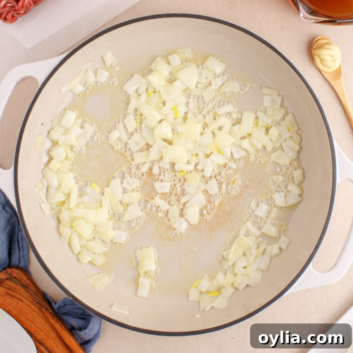 sauteeing onions in butter until translucent