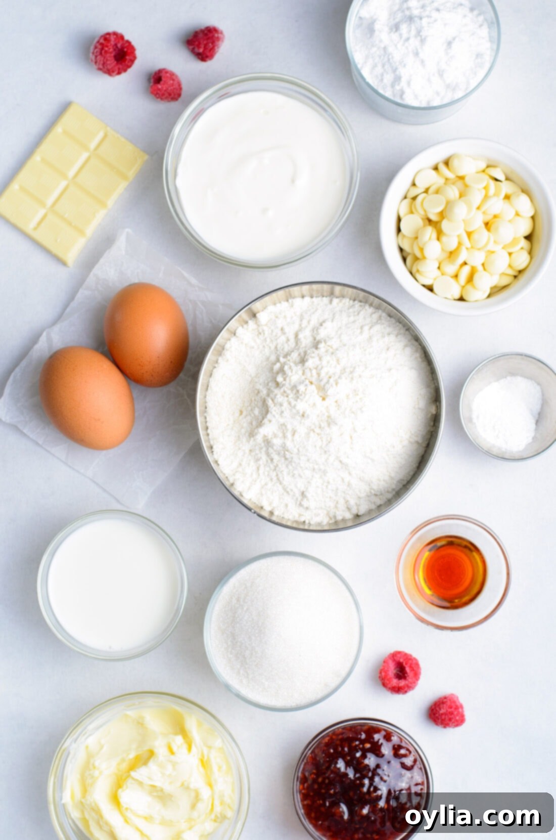 ingredients for making Raspberry White Chocolate Cupcakes laid out on a counter