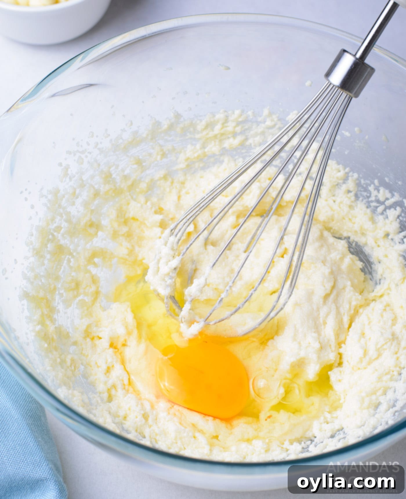 whisk stirring flour, eggs, and baking powder